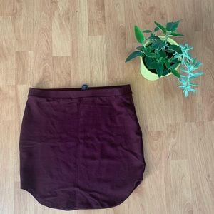 Short maroon skirt